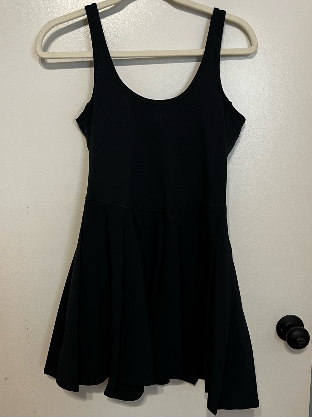 Athletic, pleated dress